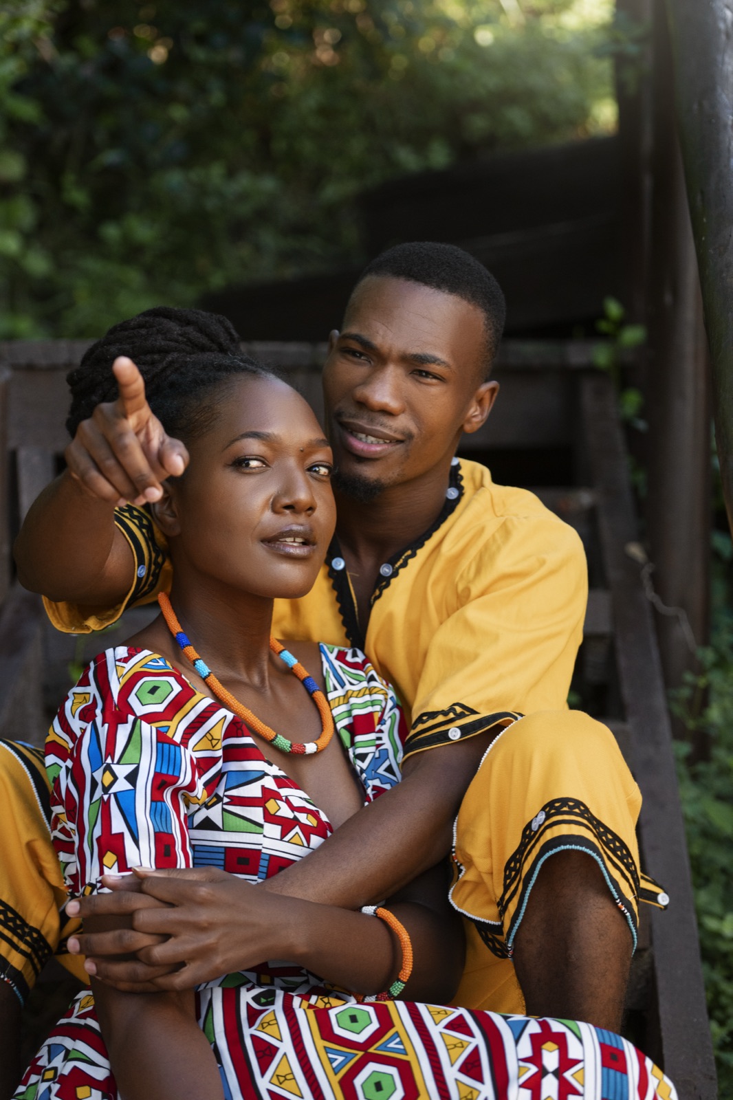 Nia and Kamau laughing together outdoors